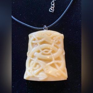 Celtic Norse Carved Pendant very striking include cord